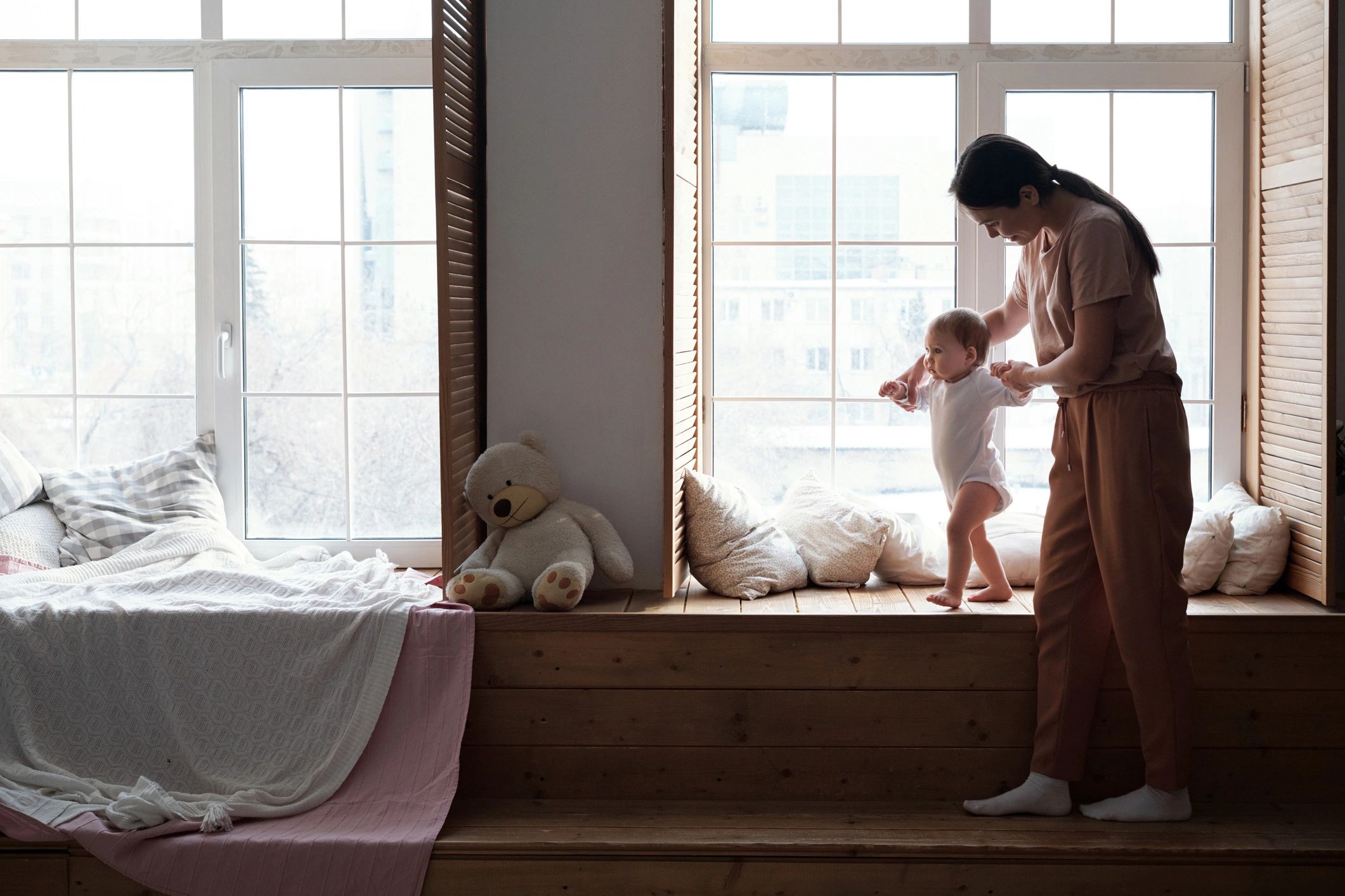 Michal with baby at home