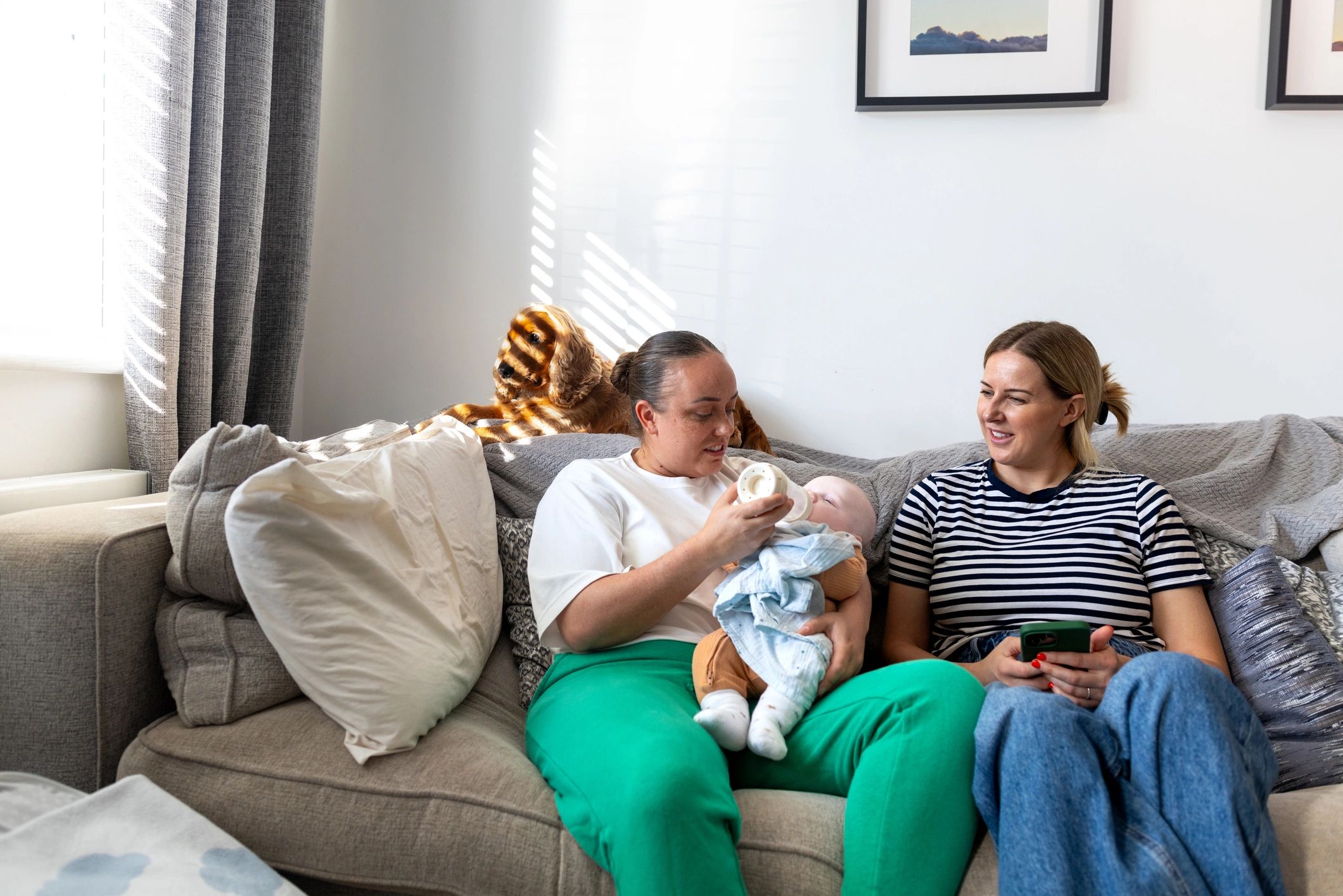 Family at home with newborn