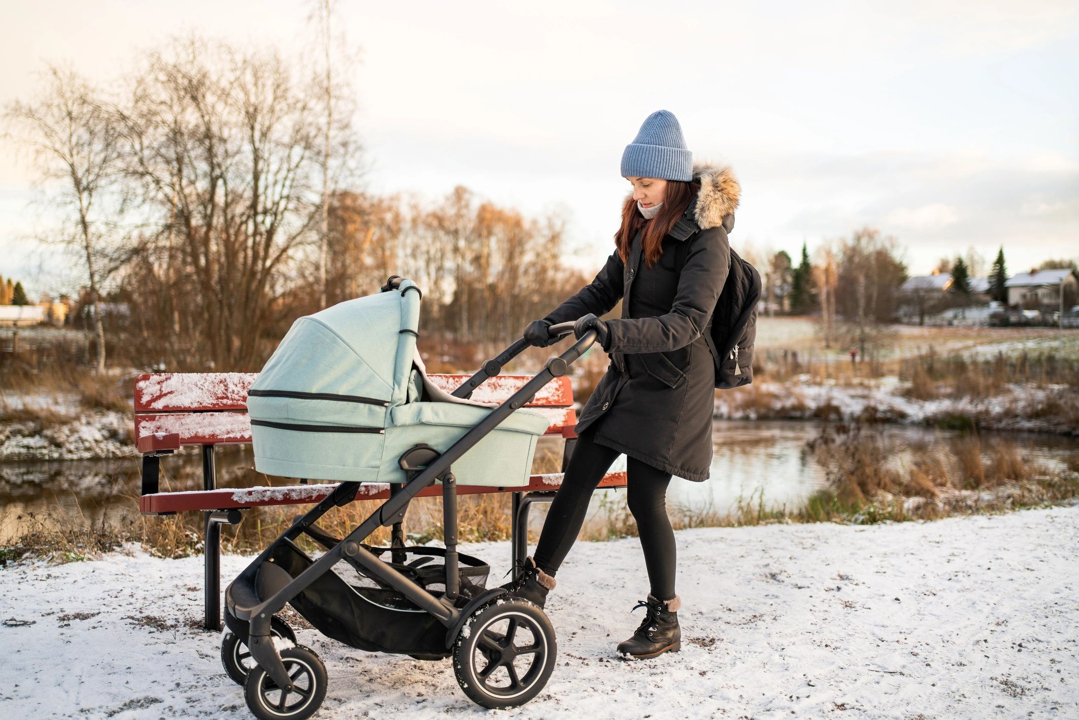 Mother with stroller outdoors
