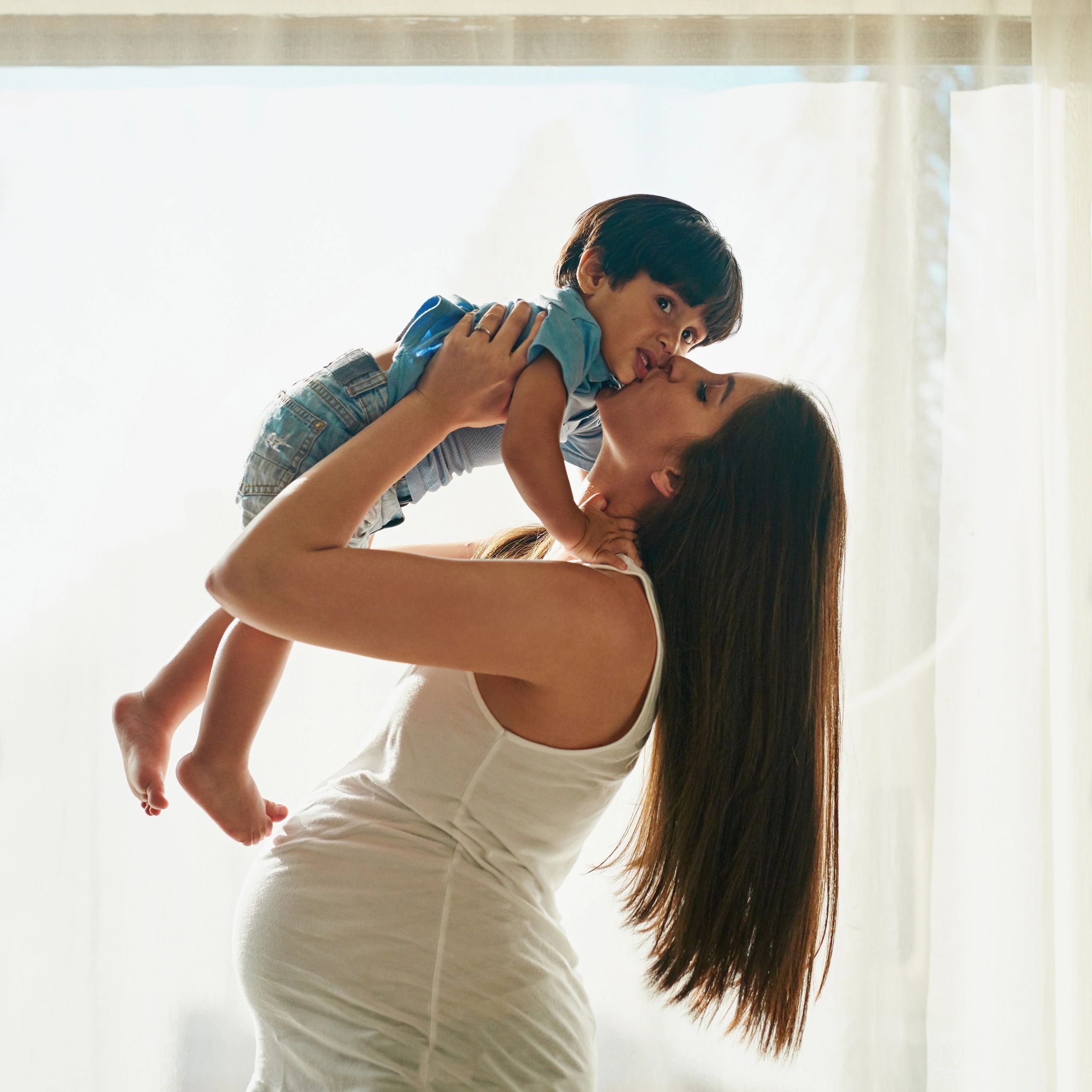 Mother and child together at home